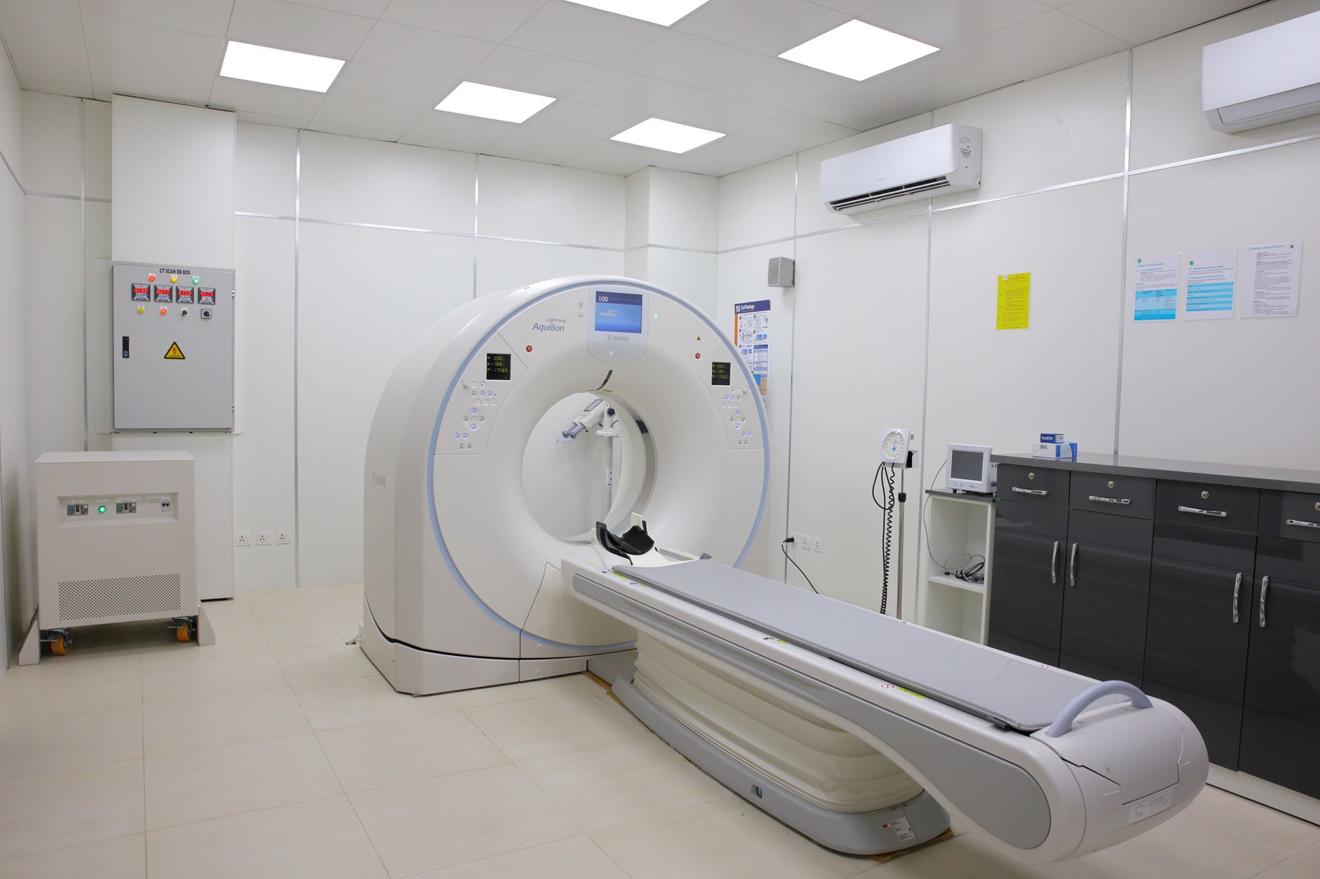 A state-of-the-art diagnostic imaging room featuring a CT scanner and medical equipment