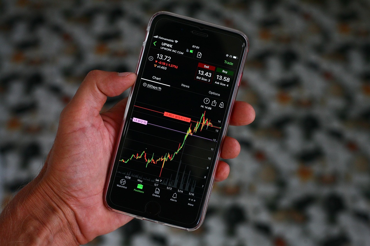 Iphone, stocks, market — TradingSphere Review - Discover Advanced Features for Smarter Online Trading