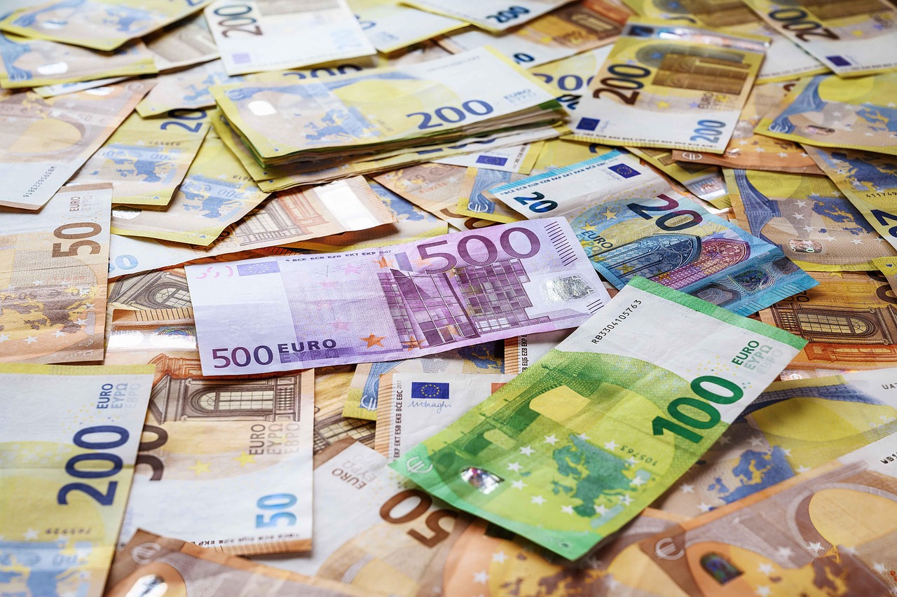 Banknotes, currency, finance — Understanding Puerto Rico Tax Incentives and How They Encourage Economic Growth and Investment