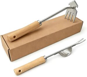 Two gardening tools on a plain background